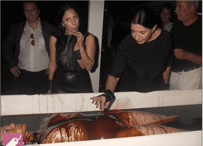 Lady Gaga scooping a human at art show
