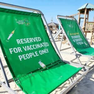 chairs for vaccinated only on Tel Aviv beach